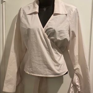 Women's pastel pink wrap blouse